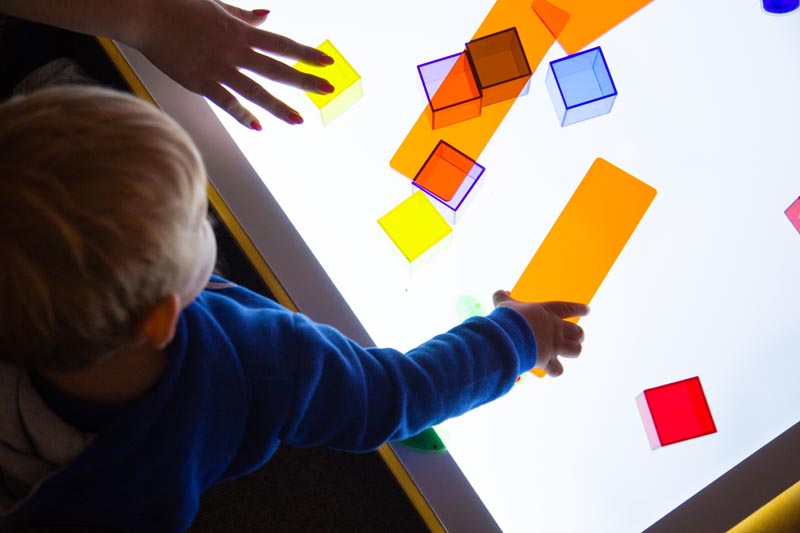 Indoor play with screen and blocks